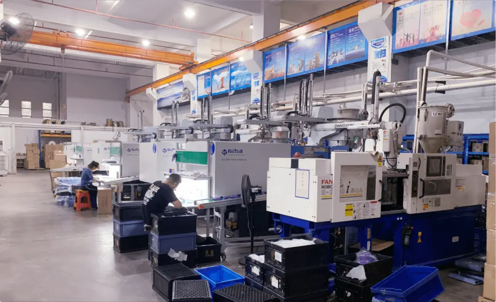 Plastic injection molding machines in production
